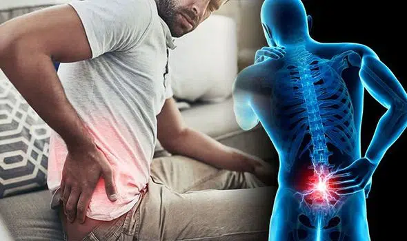 Man having spinal discomforts limiting his movements